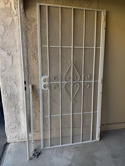 White Metal Security Screen Door with Scrollwork