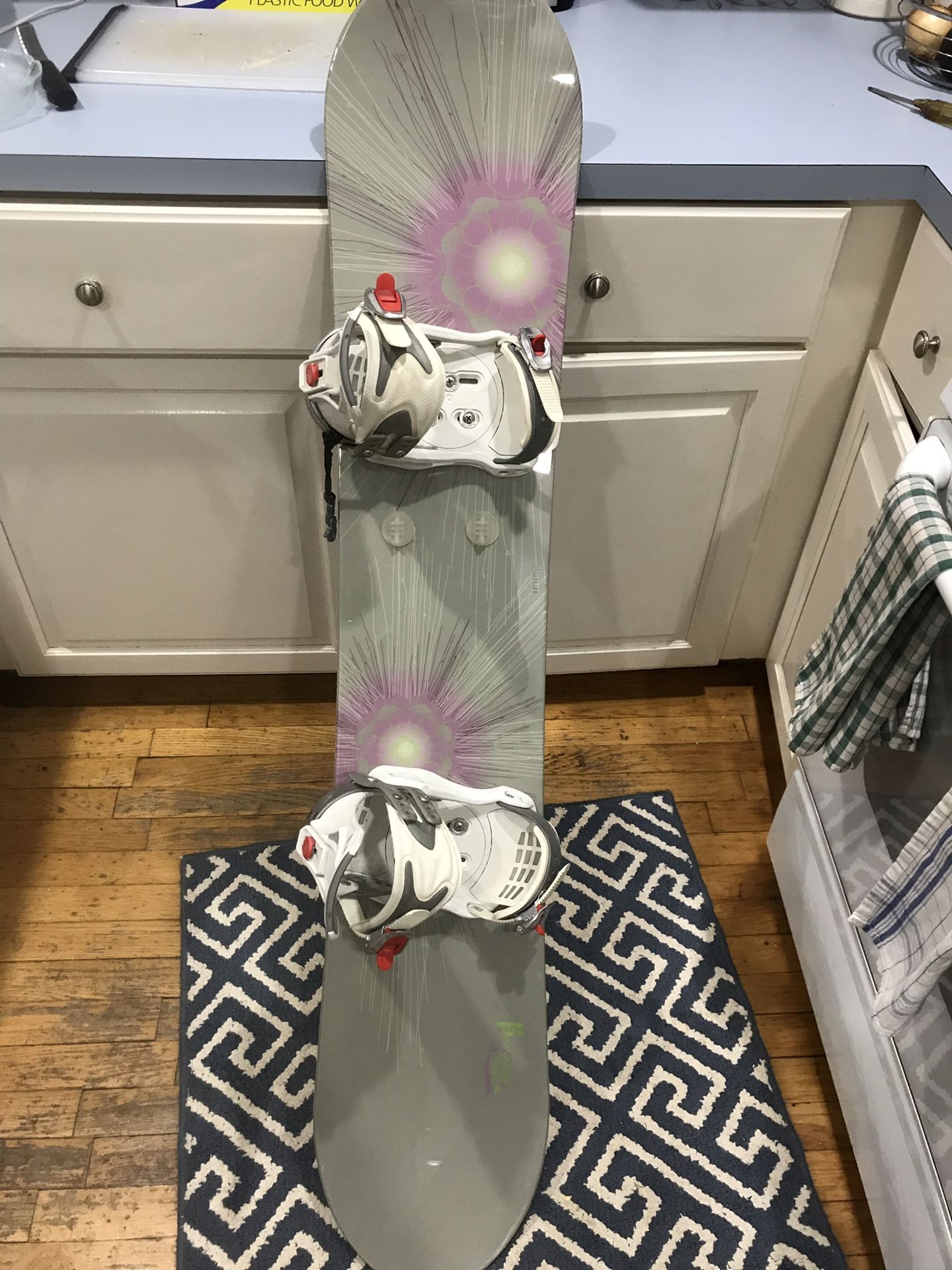 Burton women’s snowboard with Drake bindings