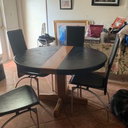 Oak Ovel Table 49” X29”  4 Chairs 