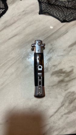 Switchblade comb