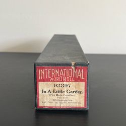 International Word Roll Piano Player In A Little Garden 93397 Antique 1926