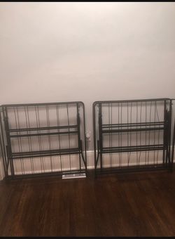 2 twin size metal frames