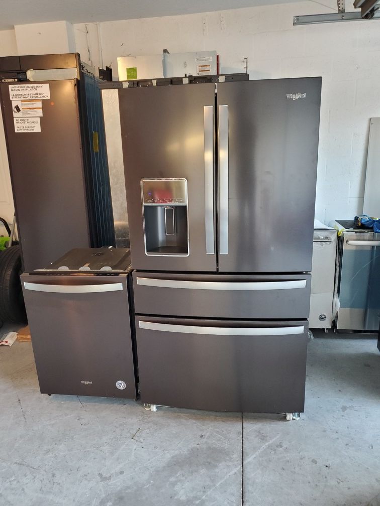 Black stainless steel 4 door fridge. And dishwasher