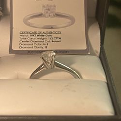 Brand new 1/2ct Tdw Engagement ring set in white gold band