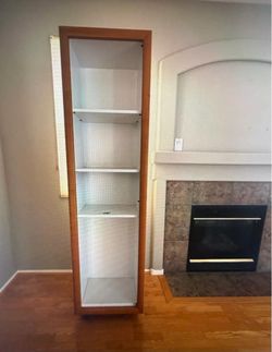 $2000 Ligne Roset wheeled Tall Bookcase with Glass Shelves