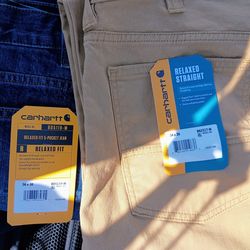 2 pairs of Carthart jeans