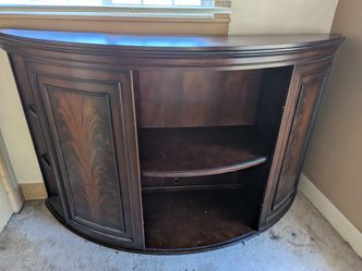 Curved wooden entertainment table