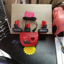 3 M12 MILWAUKEE BATTERIES AND 1 M12 CHARGER