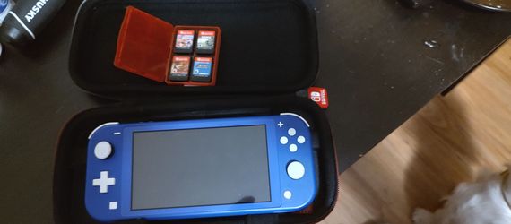 Nintendo Switch Lite Blue with Case and Games