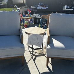 2 Chair And Table.  Excellent Condition.  No Stains Or Tears.  Chairs Are Heavy.