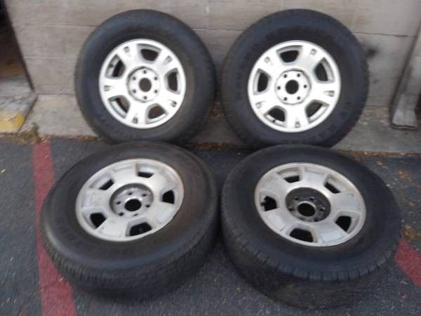 Mismatched 17 inch aluminum Chevy rims with tires $50 each