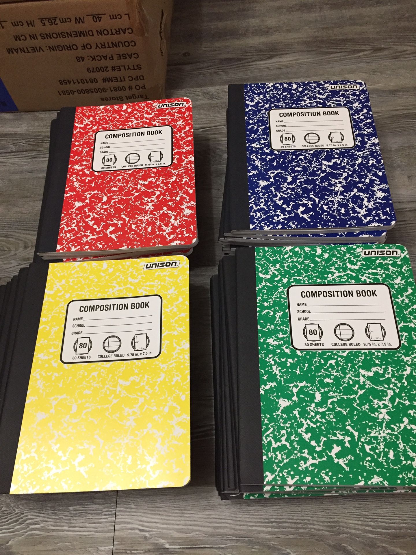Box of 48 composition notebooks