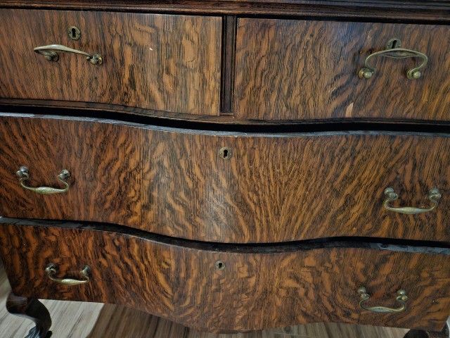 Antique Tiger Oak Serpentine Dresser