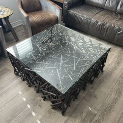 ZGallerie Wood Posts Stacked Collage Living Room Coffee Table with Thick Tempered Glass top Coffee Table, (38" x 38"x 18"). In Excellent Condition.