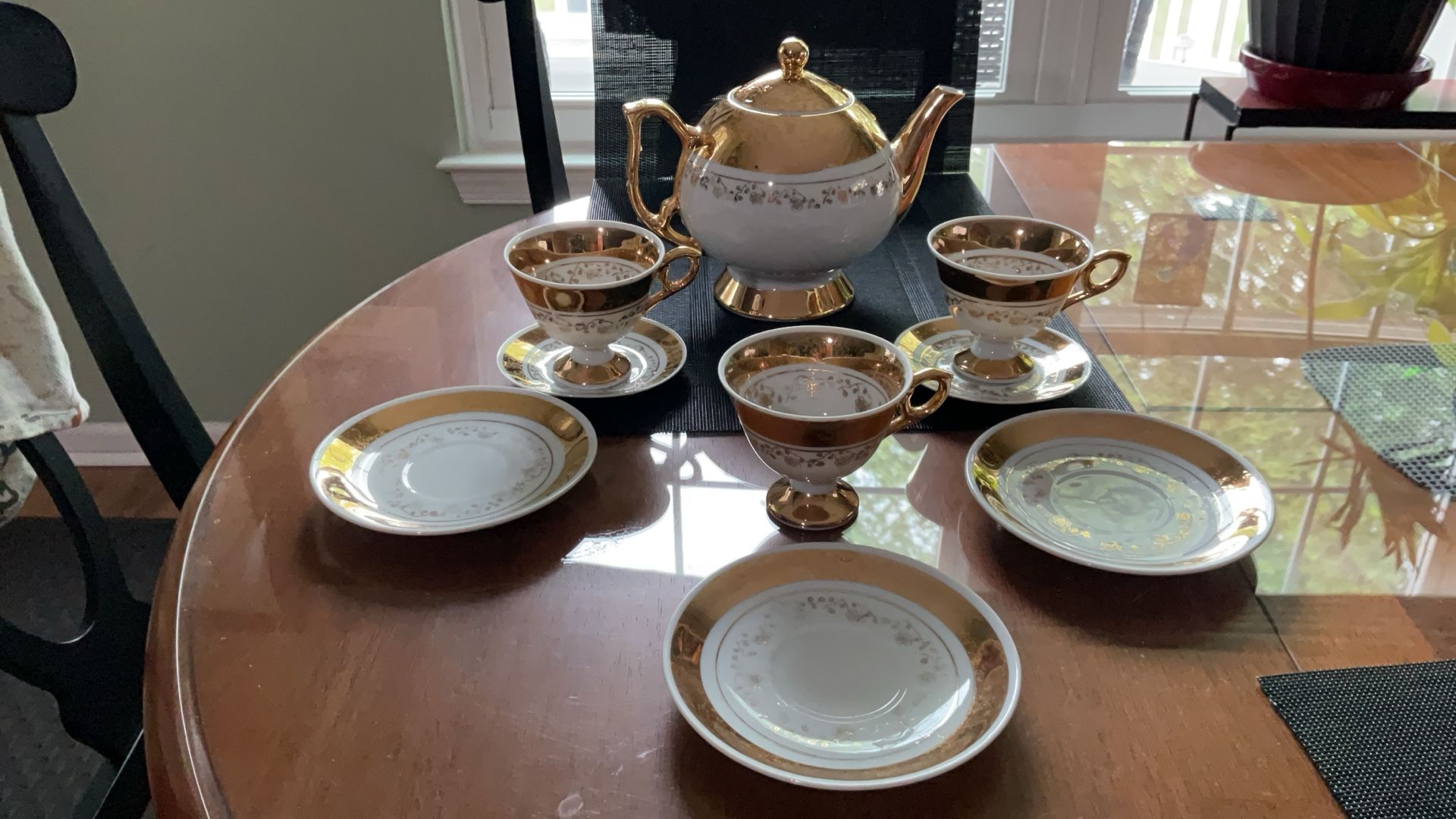 Gold And White Porcelain Teapot With Parts Of A Bavaria Demitasse Set