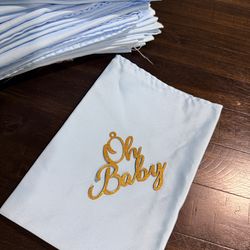 48 baby blue napkins and 11 oh baby gold letters