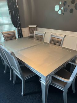 Silver dining table/ sidebar, and chairs