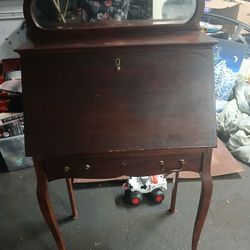 Antique Desk With Drawer At The Bottom And A Mirror On The Top 