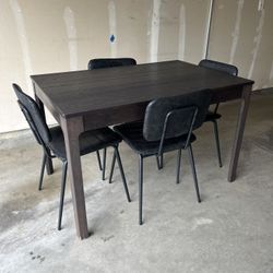 Dining Table And Four Chairs 