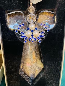 Stunning large faceted crystal angel with brooch like center
