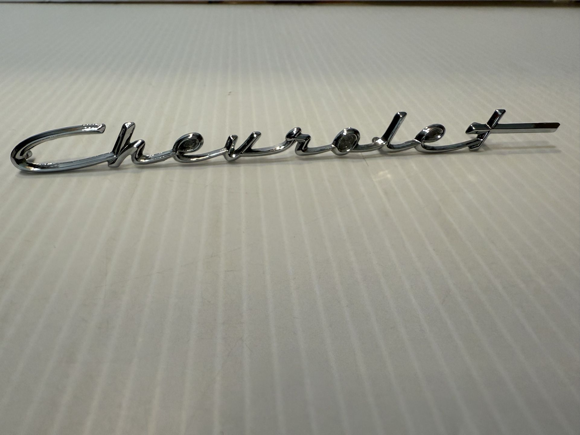 CHEVY CHROME CHEVROLET SCRIPT ON DASH (Parts)