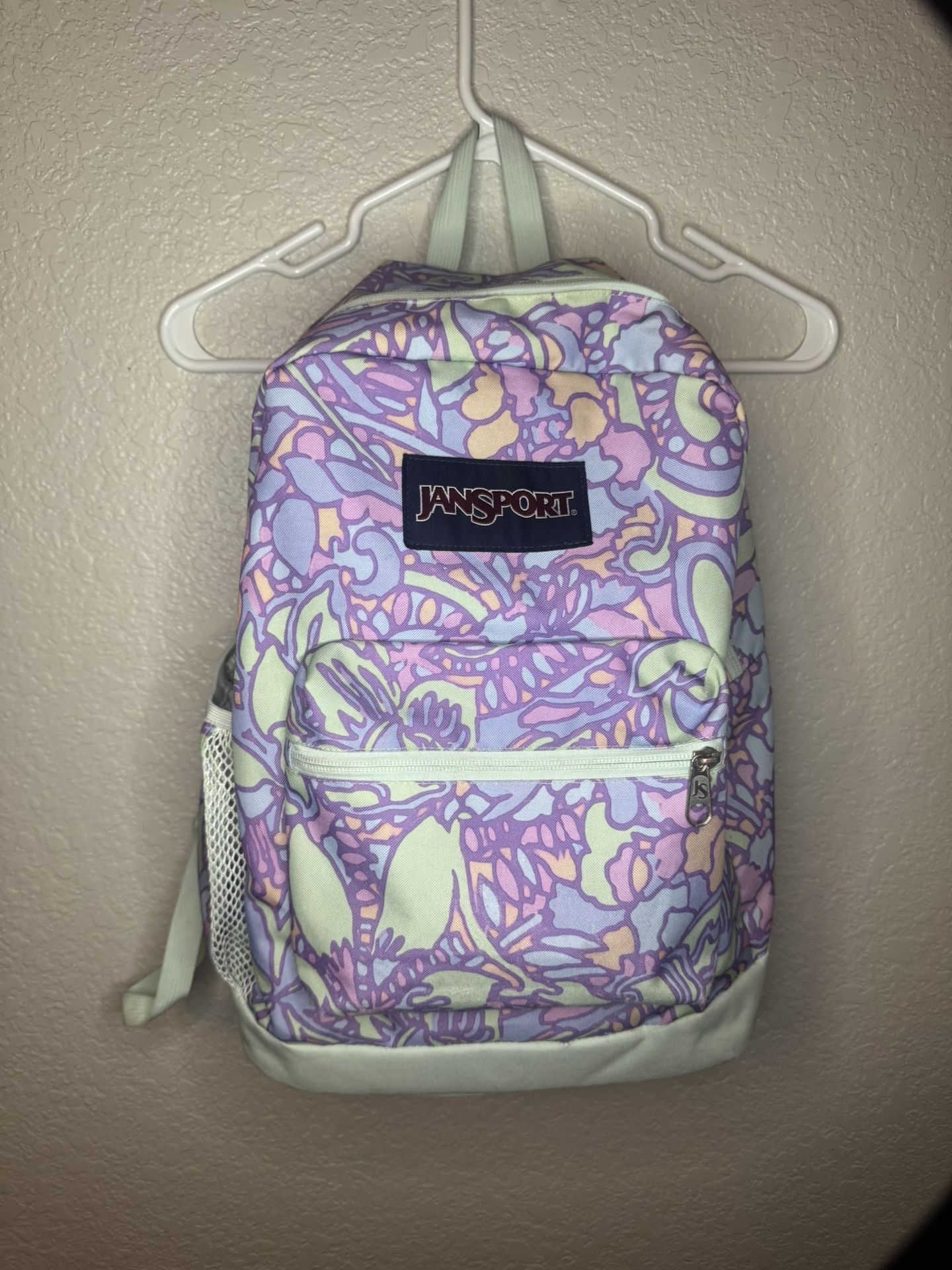 JanSport Cross Town Plus 17" Backpack in the "Fluid Slice of Fun" Pattern