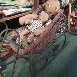 Dolls In Buggy