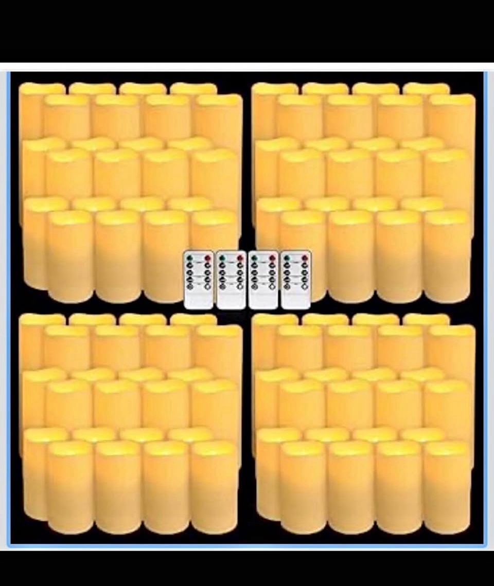 New in it’s box Set of 96 Waterproof Outdoor Flameless Candles, LED Candles with 4 Remote and Timer,