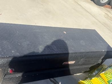 It's a tool chest for a back of a truck. Standard truck width