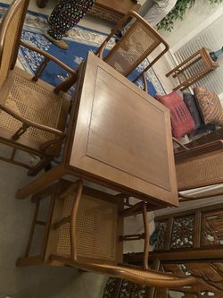 Solid teak wood and four arm chairs