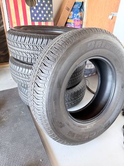 New Bridgestone Dueler H/T Tires 265/70/17 4 Tires