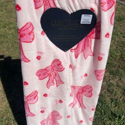 Oversized pink bow blanket