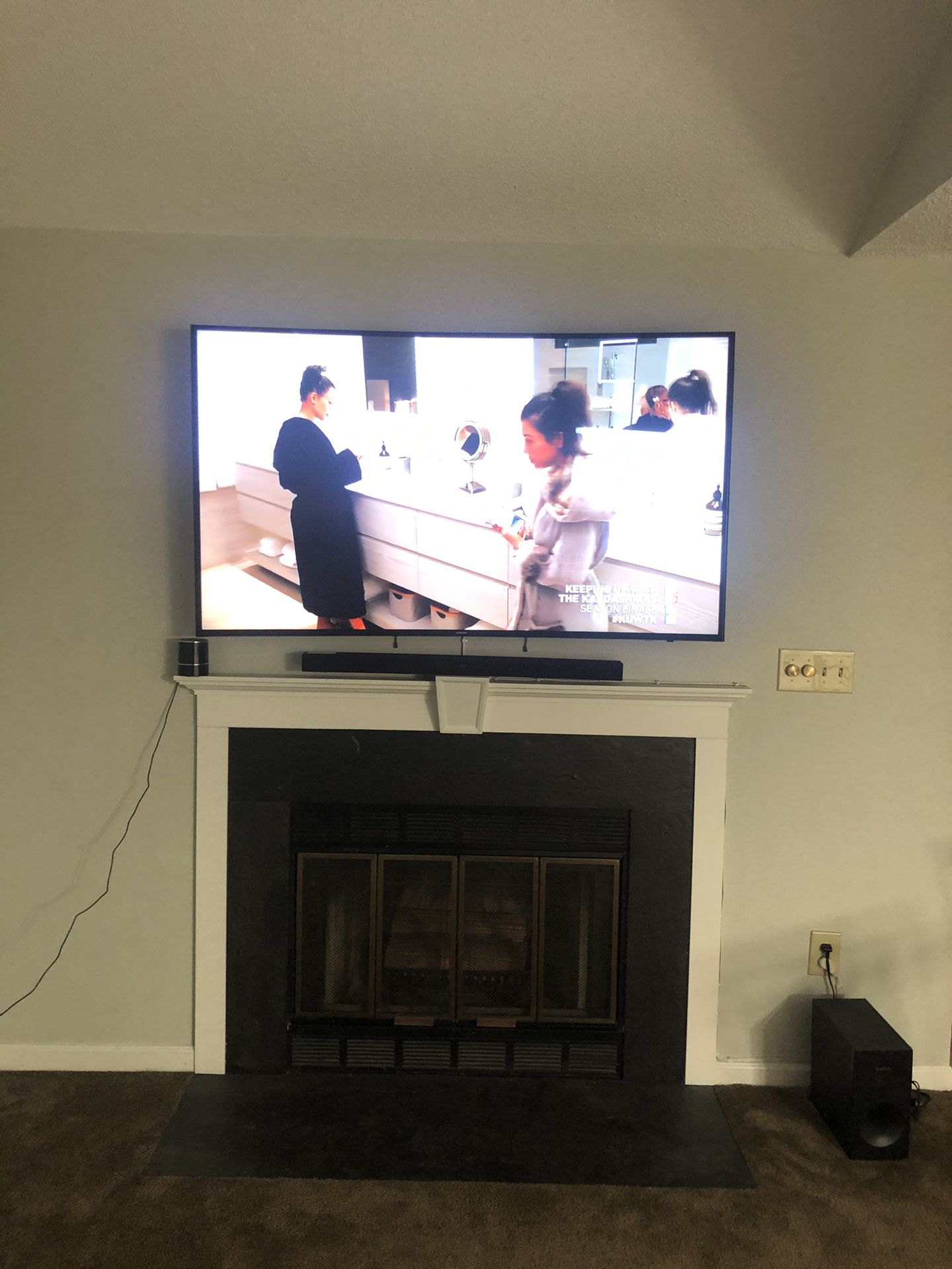 Samsung 65” curve and Samsung sound bar with extra wireless speakers