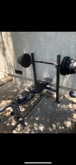 Weight Bench +bars and weights (250+lbs)