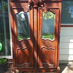 Antique French Carved Elm Armoire with Beveled MIrror Doors



MAKE OFFER


