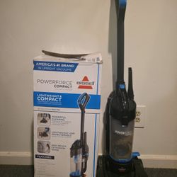 Bissell PowerForce Compact bagless upright vacuum cleaner. It is a lightweight and compact model designed for daily cleaning on a variety of surfaces.