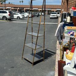 4-tier ladder bookshelf featuring a metallic gold frame
