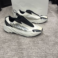 adidas Yeezy Boost 700 MNVN Laceless Analog sneakers.