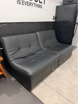 Two Faux Leather Chairs