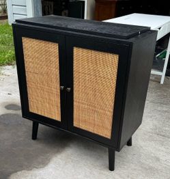 Black Cabinet with Rattan Cane Door Panels