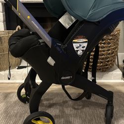 Doona Stroller With Carseat, Base, and Doona Storage Organizer