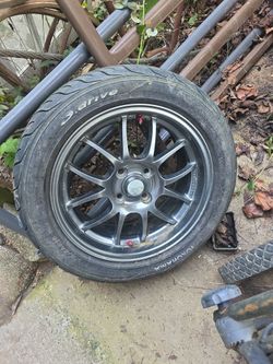 949 Racing Rim And Tire With 85% Tread