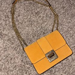 Kate Spade tan crossbody bag with gold chain
