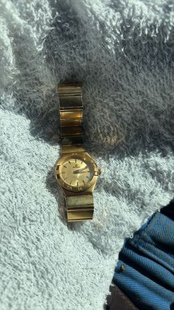 Vintage Omega Constellation two-tone quartz wristwatch.