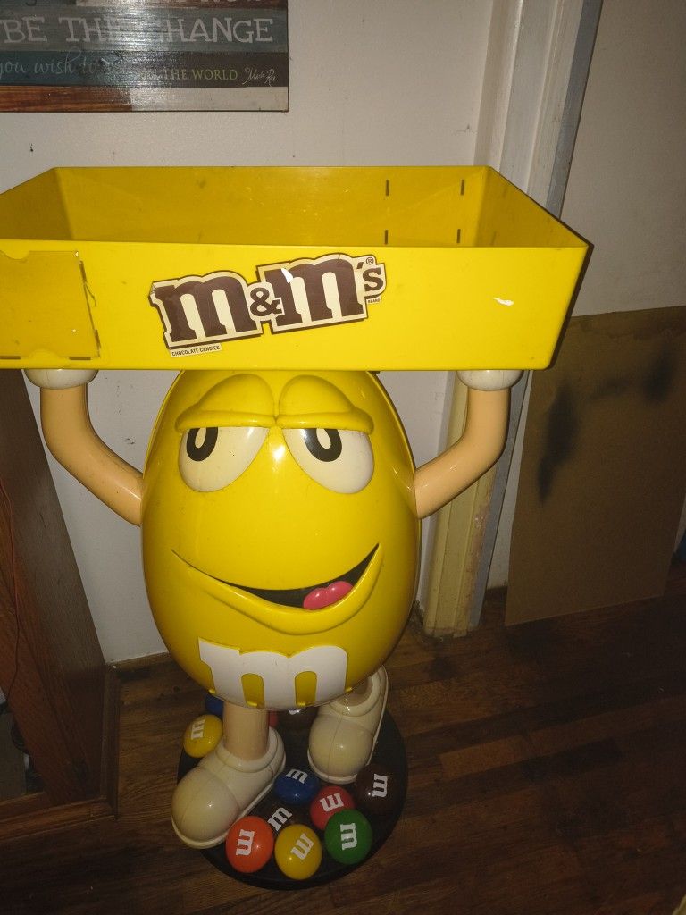 Yellow M@M Guy For Sale He Is About 4 Feet High Definitely A Conversation Piece They Don't Just Sell These It's A Display