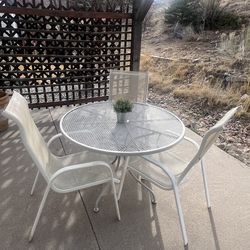 Table with chairs outside furniture
