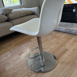 Swiveling Faux Leather Bar Stool