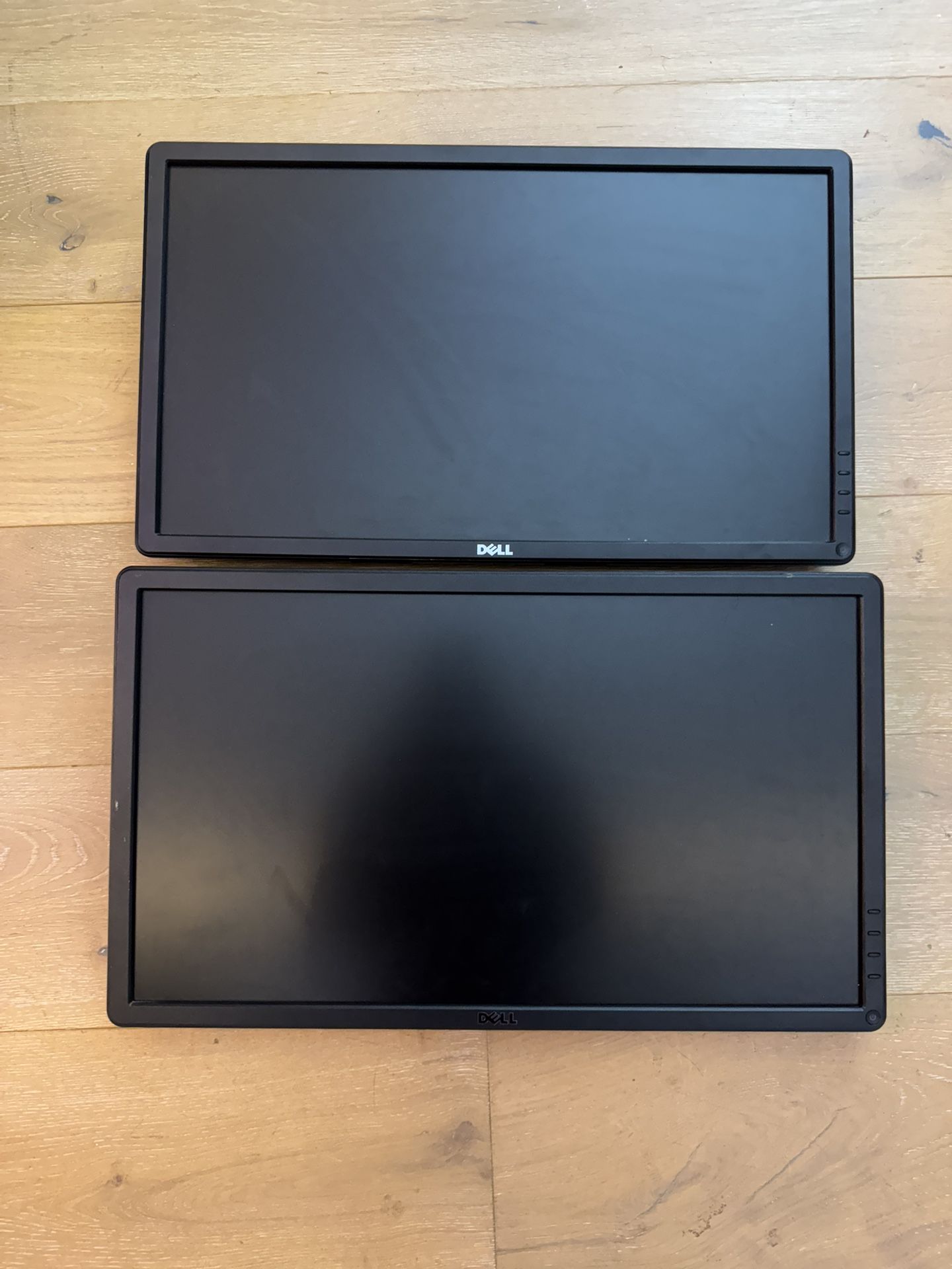 Two 24 Inch Dell monitors