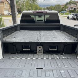 Decked truck bed storage drawer system