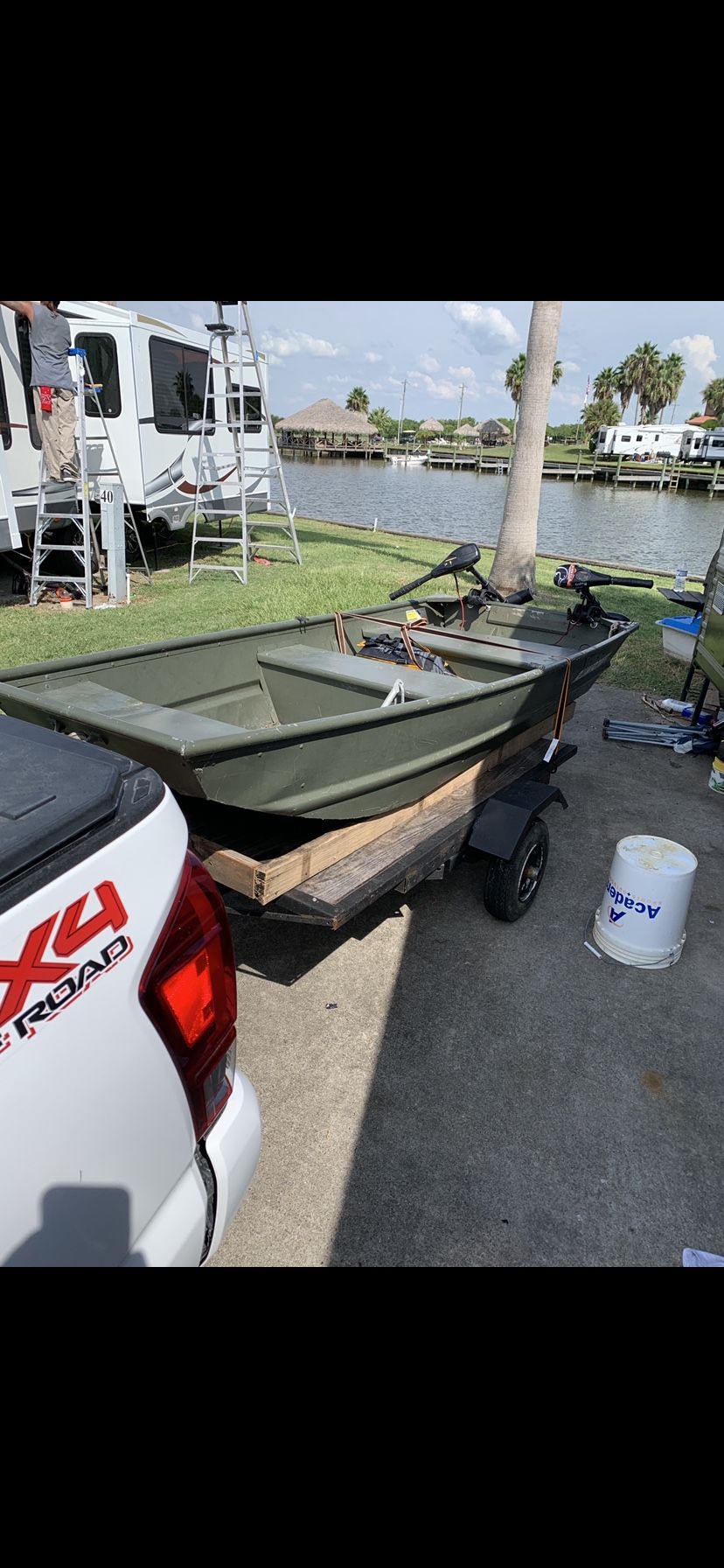 10 ft Jon boat with trailer, battery, anchor, and minn Kota 30 lb
